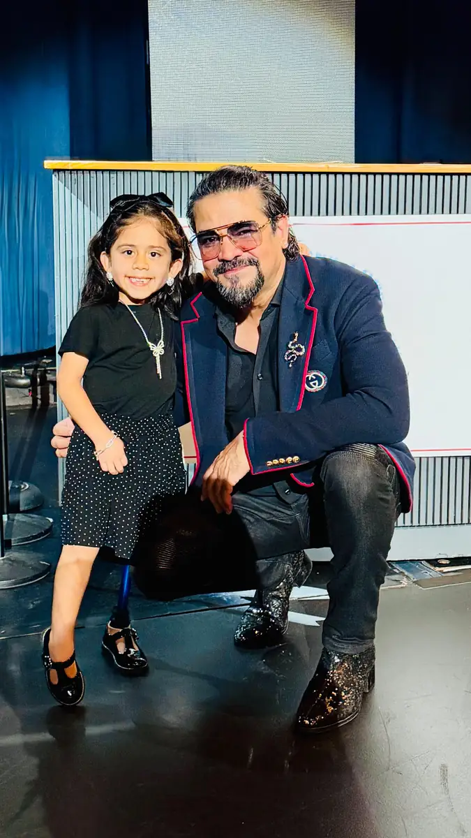 Founder Vikram Choudhary with a young patient at the Quantum Clinics Fashion Show