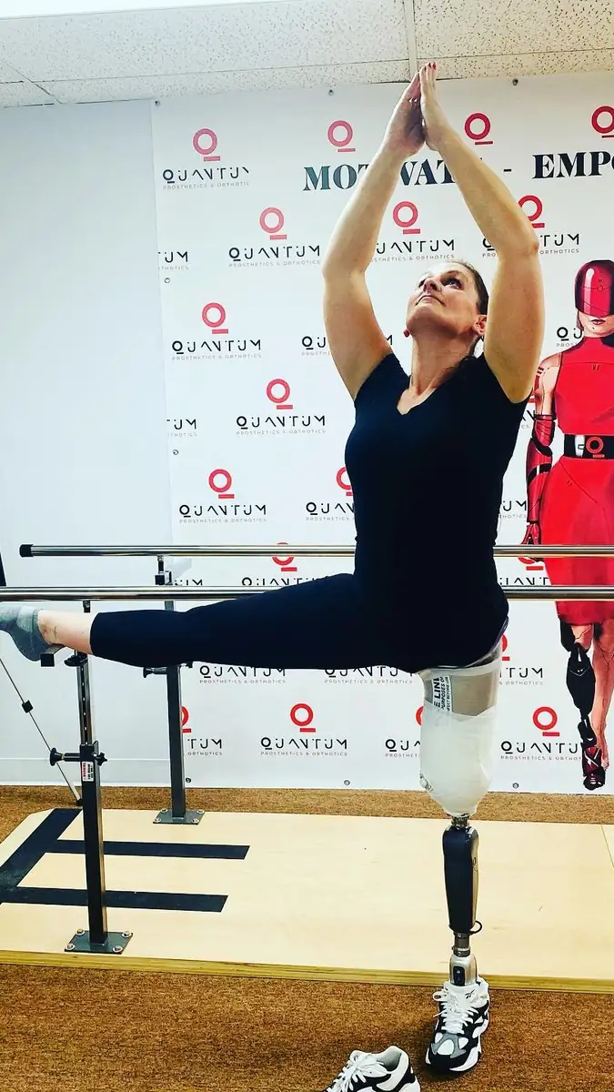A patient demonstrating mobility at the Quantum Clinics Fashion Show